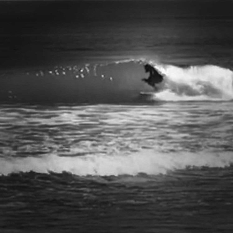 California artist Matt Beard tucking into a tight pocket while surfing in Central California
